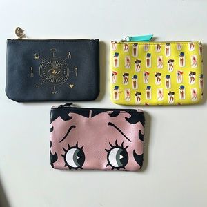 Ipsy Betty Boop, Black Gold Magic, and Sunbathers Swimsuits bags